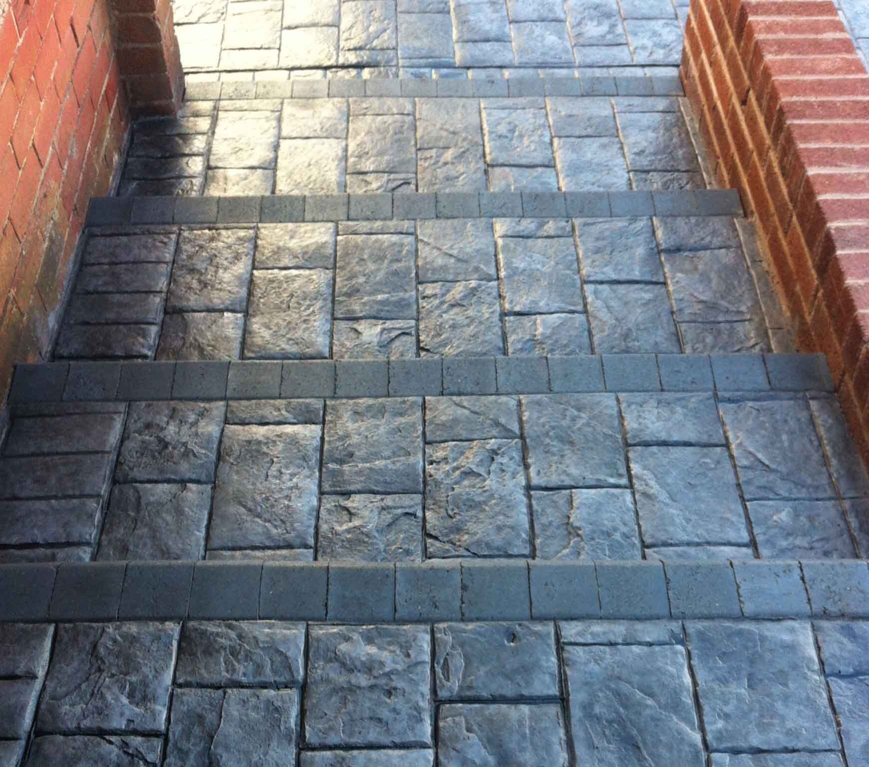 Stone steps with brick sides, descending toward the viewer.