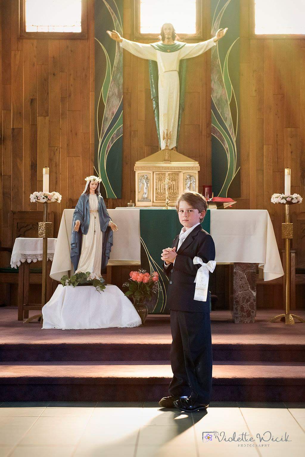 boy in church for Communion