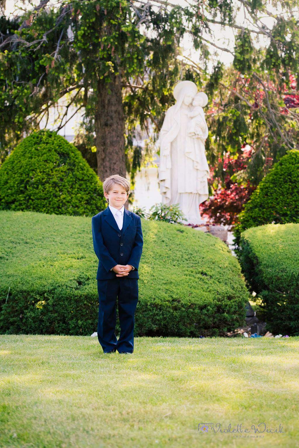 Communion dress boy wearing  in blue color