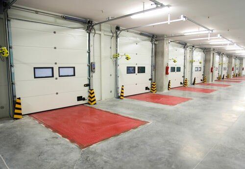 Commercial Garage Doors — Secured Garage in Amsterdam, NY