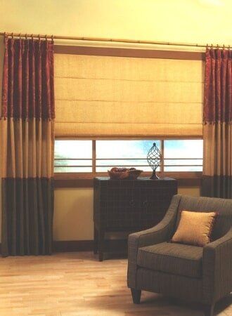 A living room with a chair and a window