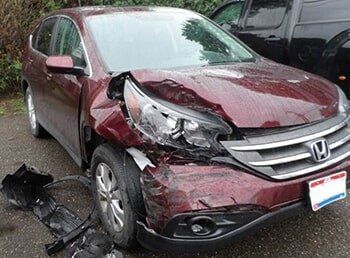 Before Maroon Honda Car for Repair — Dover, OH — Cua Refinishing Co.