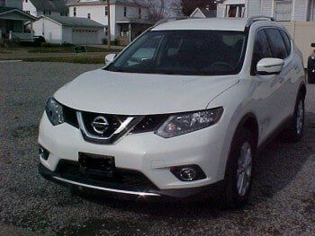 After Front Damaged White Car — Dover, OH — Cua Refinishing Co.
