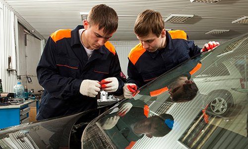 Collision Center — Mechanics Replacing Car Window in Dover, OH Collision Center — Mechanics Replacing Car Window in Dover, OH