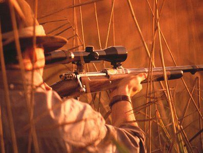 Man aiming to shoot - Gun Restoration in Berlin, NJ Man aiming to shoot - Gun Restoration in Berlin, NJ