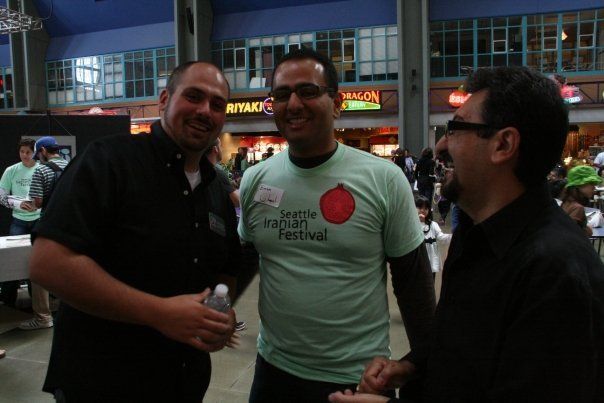 A man wearing a shirt that says happy harvest festival