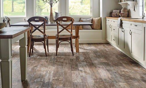 Foot on Vinyl Floor — Floor in Sacramento, CA Foot on Vinyl Floor — Floor in Sacramento, CA