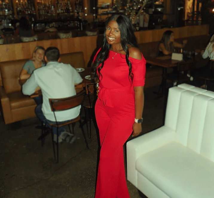 Single & not settling! Dymond in red jumpsuit