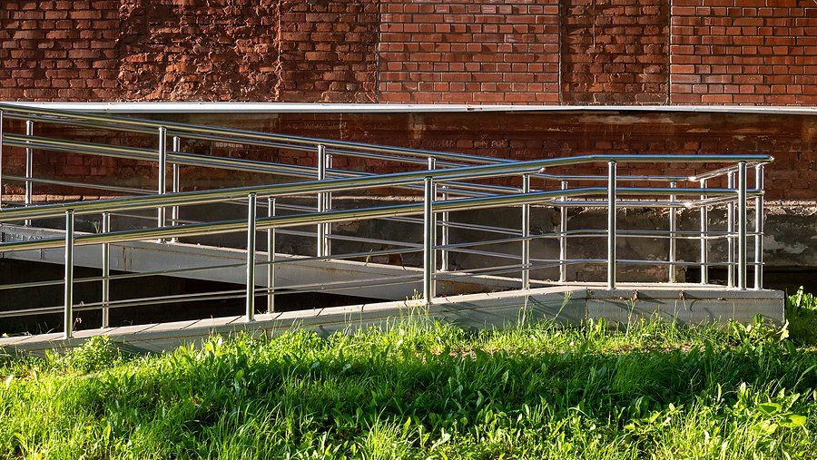 wall made of bricks with handrails