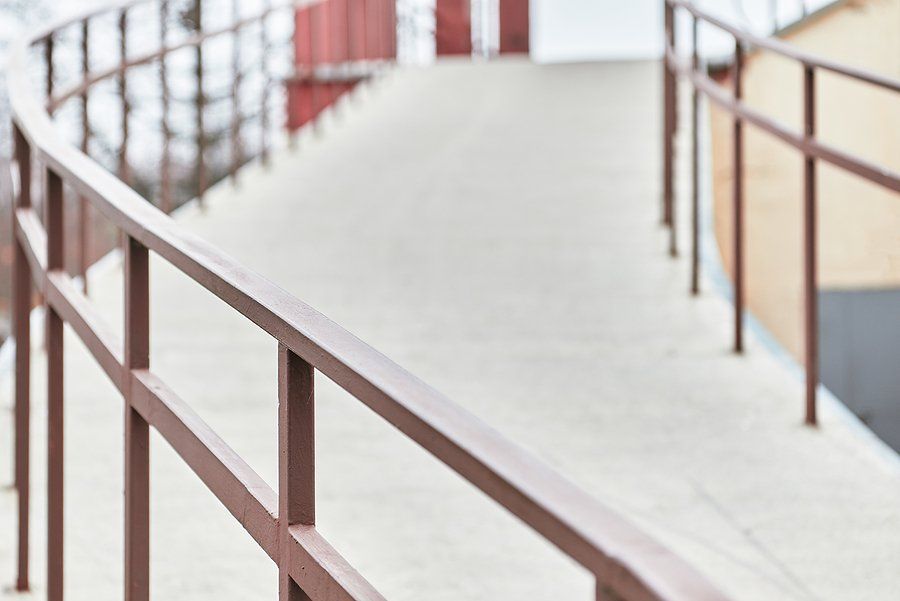 a walkway stainless steel railing