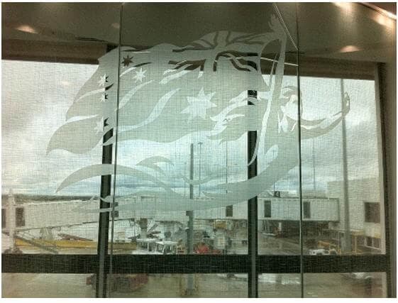 Corporate Logo Designed in Window Glass — Affordable Tinting in Trinity Beach, QLD