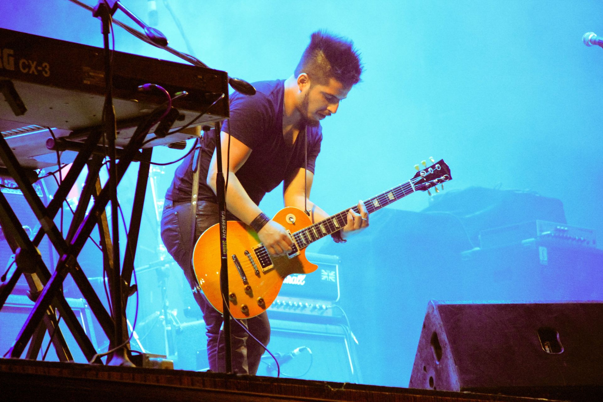 play guitar on stage