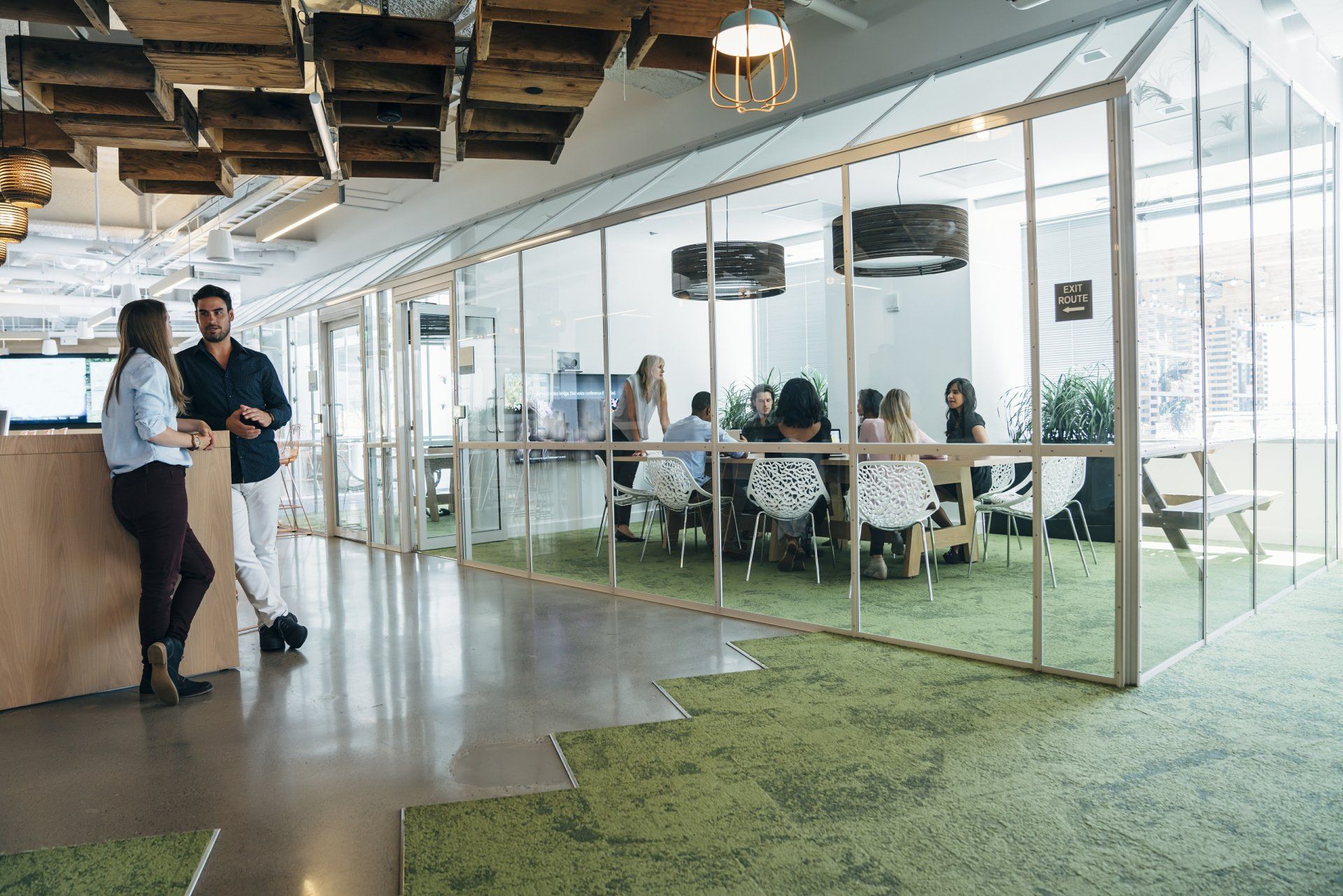 A group of people meeting in a conference room.