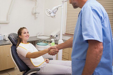 Patient greeting dentist in Salem MA