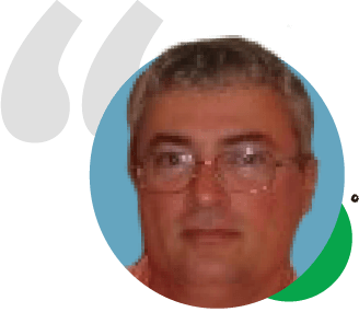 Portrait of a person with glasses in a circular blue-and-green logo