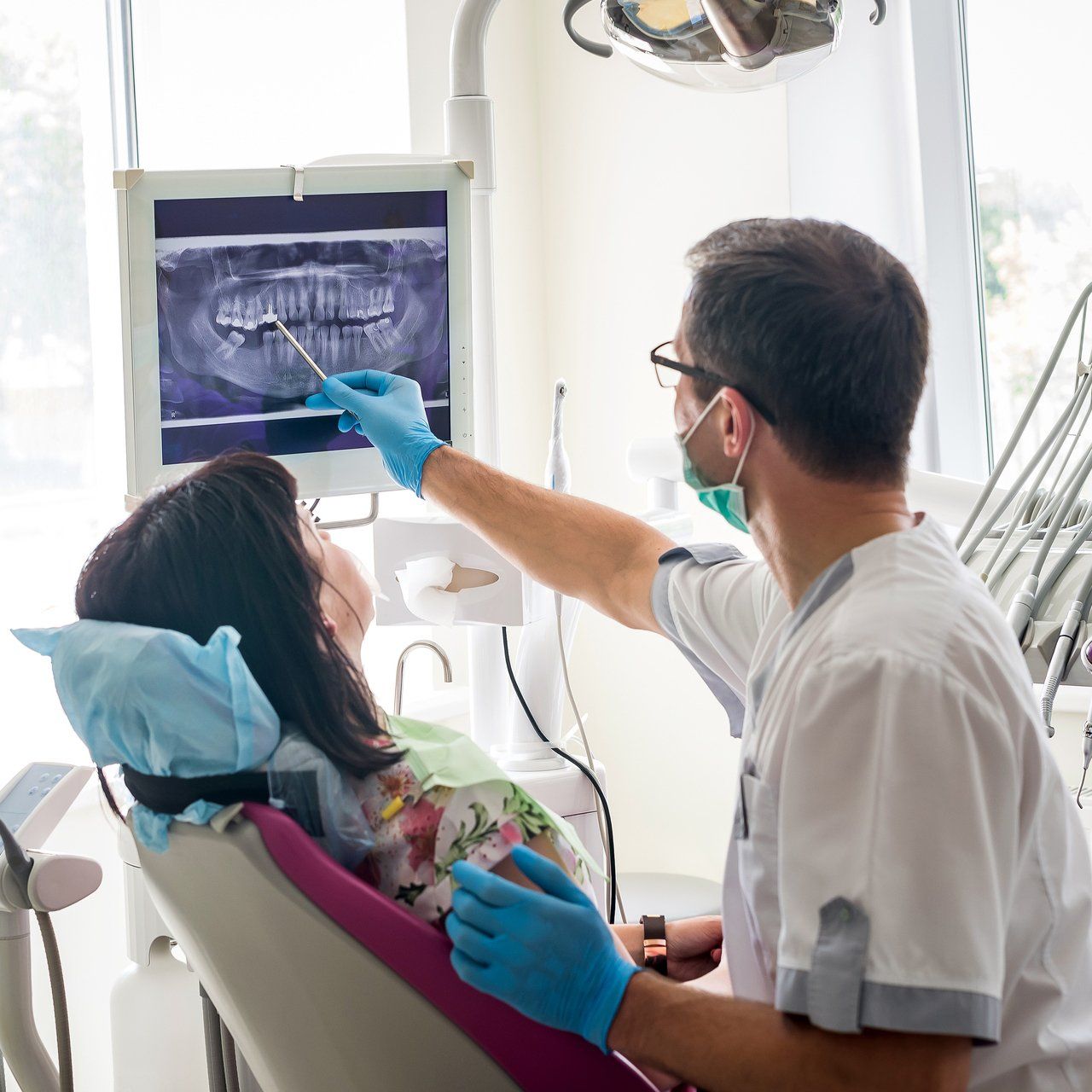 Examining Patient's Teeth Using Digital X-Ray — Katy, Texas — Katy Dental Studio Examining Patient's Teeth Using Digital X-Ray — Katy, Texas — Katy Dental Studio
