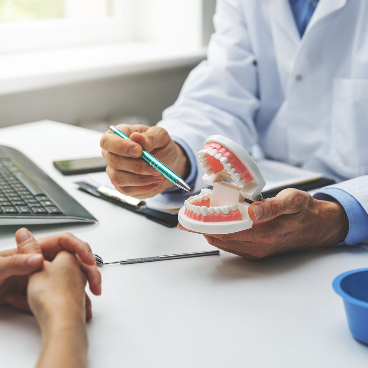Dentist And Patient Discussing About Dental Treatment — Katy, Texas — Katy Dental Studio