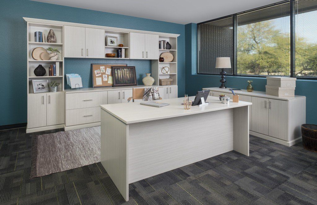 Custom home office cabinetry system with an arctic finish