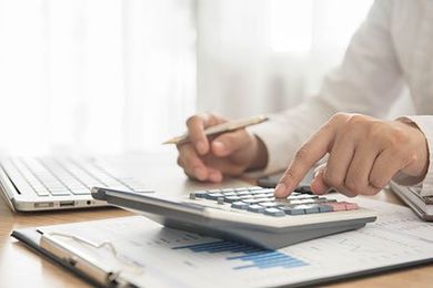 Calculator and Money — Bookkeeping Services in Fort Collins, CO Calculator and Money — Bookkeeping Services in Fort Collins, CO