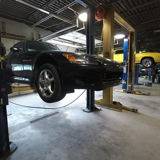 Air Conditioning — An Auto Repair Hanging In A Auto Shop in Kendallville, IN Air Conditioning — An Auto Repair Hanging In A Auto Shop in Kendallville, IN