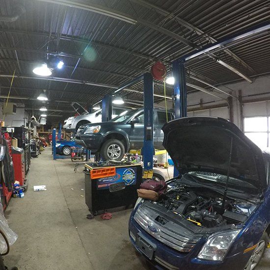 Air Conditioning — An Auto Repair Hanging In A Auto Shop in Kendallville, IN Air Conditioning — An Auto Repair Hanging In A Auto Shop in Kendallville, IN