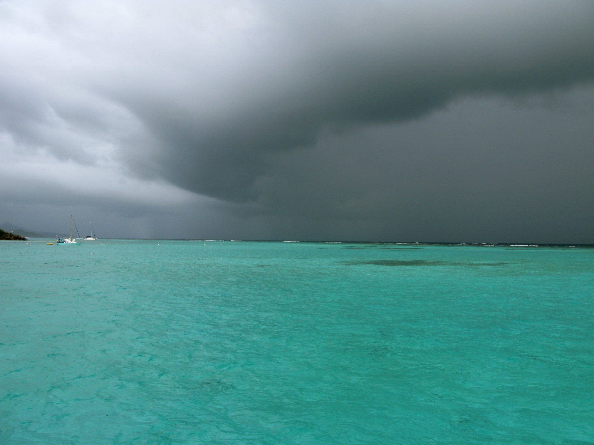 A cloudy sky over a body of water