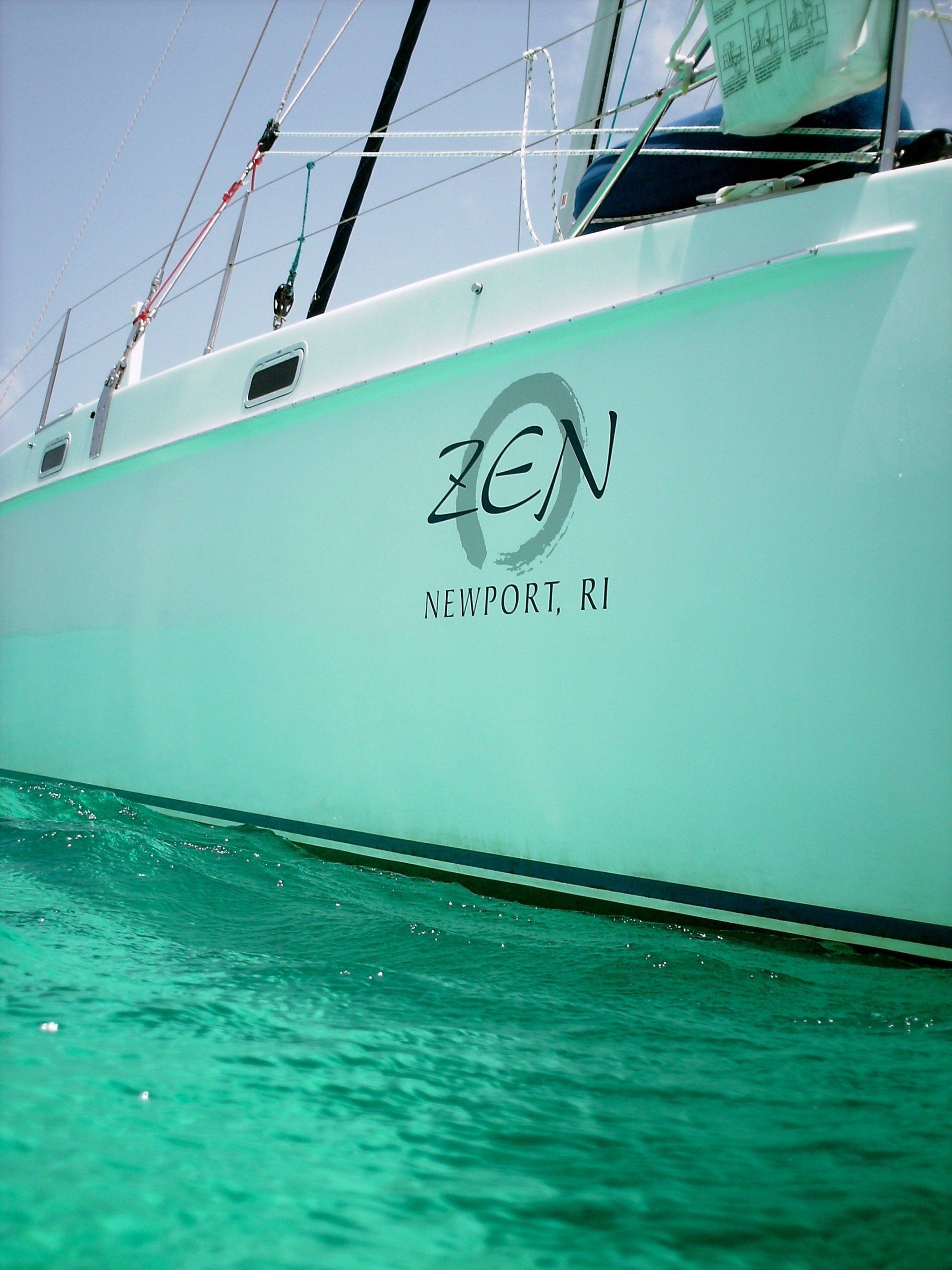 A boat with the word zen on the side of it