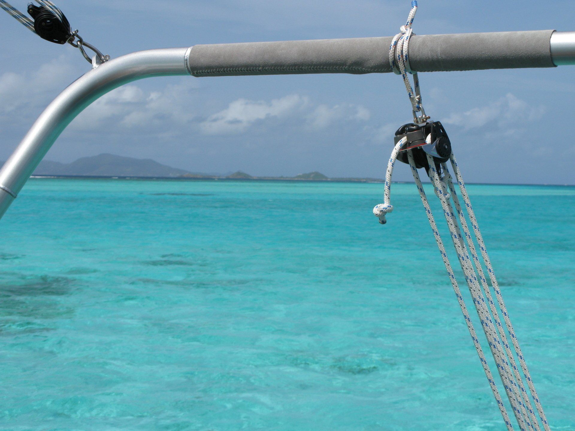 A rope is hanging over a body of water