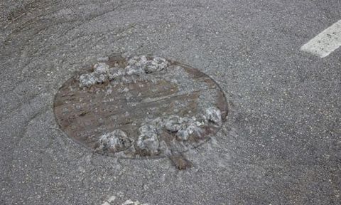 water overflowing from the drainage