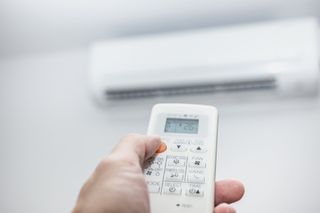 Air Condition Installation — Air Conditioner With Remote Control in Greenville, South Carolina Air Condition Installation — Air Conditioner With Remote Control in Greenville, South Carolina