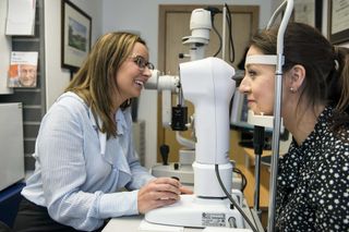 Woman getting eyesight test