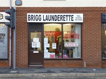 For laundry services in Brigg call Brigg Launderette and Ironing Service Basket of freshly cleaned towels