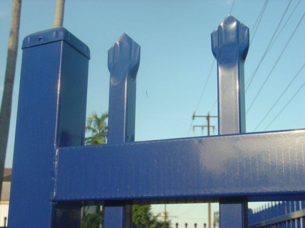 Blue fence edge — Gates Darwin in Pinelands, NT