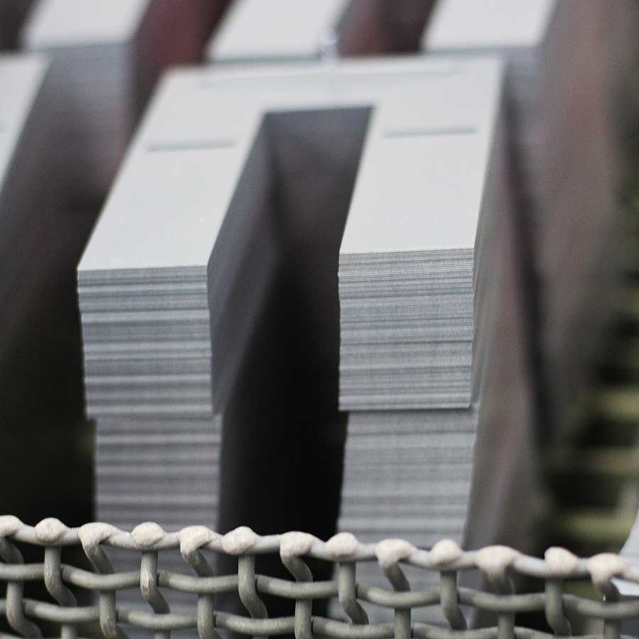 HID ballast laminations made with fully processed electrical steel