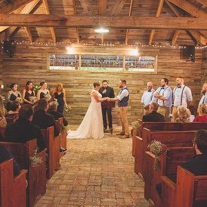 A bride and groom are getting married in a church