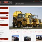 Two yellow dump trucks are parked next to each other on a website.