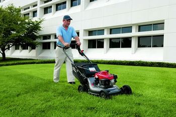 Lawn Equipment Repair — Lawn Mower Cutting Grass in Montrose, CO Lawn Equipment Repair — Lawn Mower Cutting Grass in Montrose, CO