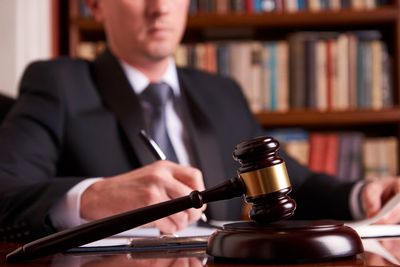 Trust and Estates — Lawyer Working with Agreement in Miami Lakes, FL