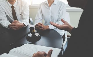 Power Of Attorney — Lawyer Discussing Laws To Businessmen in Miami Lakes, FL