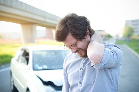 Car Accidents — Man Feeling Pain to the Neck After Car Crash in Laredo, TX