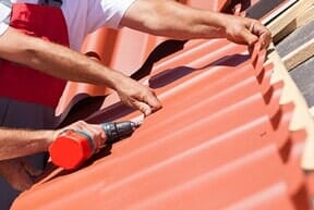 Roofers working on roof – DSR Roofing & Protective Coatings in Yuma, AZ Roofers working on roof – DSR Roofing & Protective Coatings in Yuma, AZ