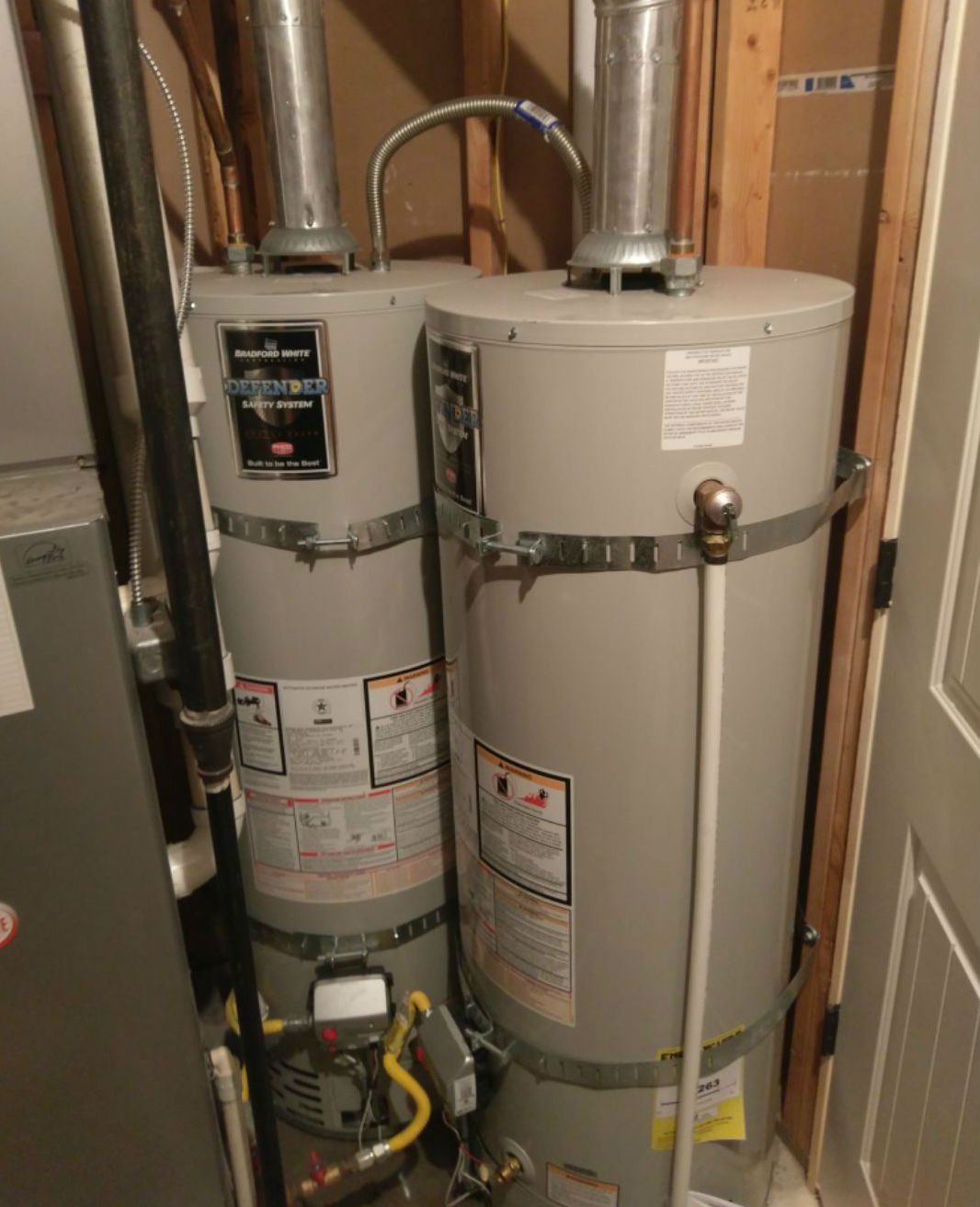 HVAC Repair — Worker Set Up Central Gas Heating Boiler in Utah Valley, UT HVAC Repair — Worker Set Up Central Gas Heating Boiler in Utah Valley, UT
