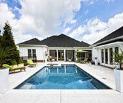 Swimming pool and home backyard