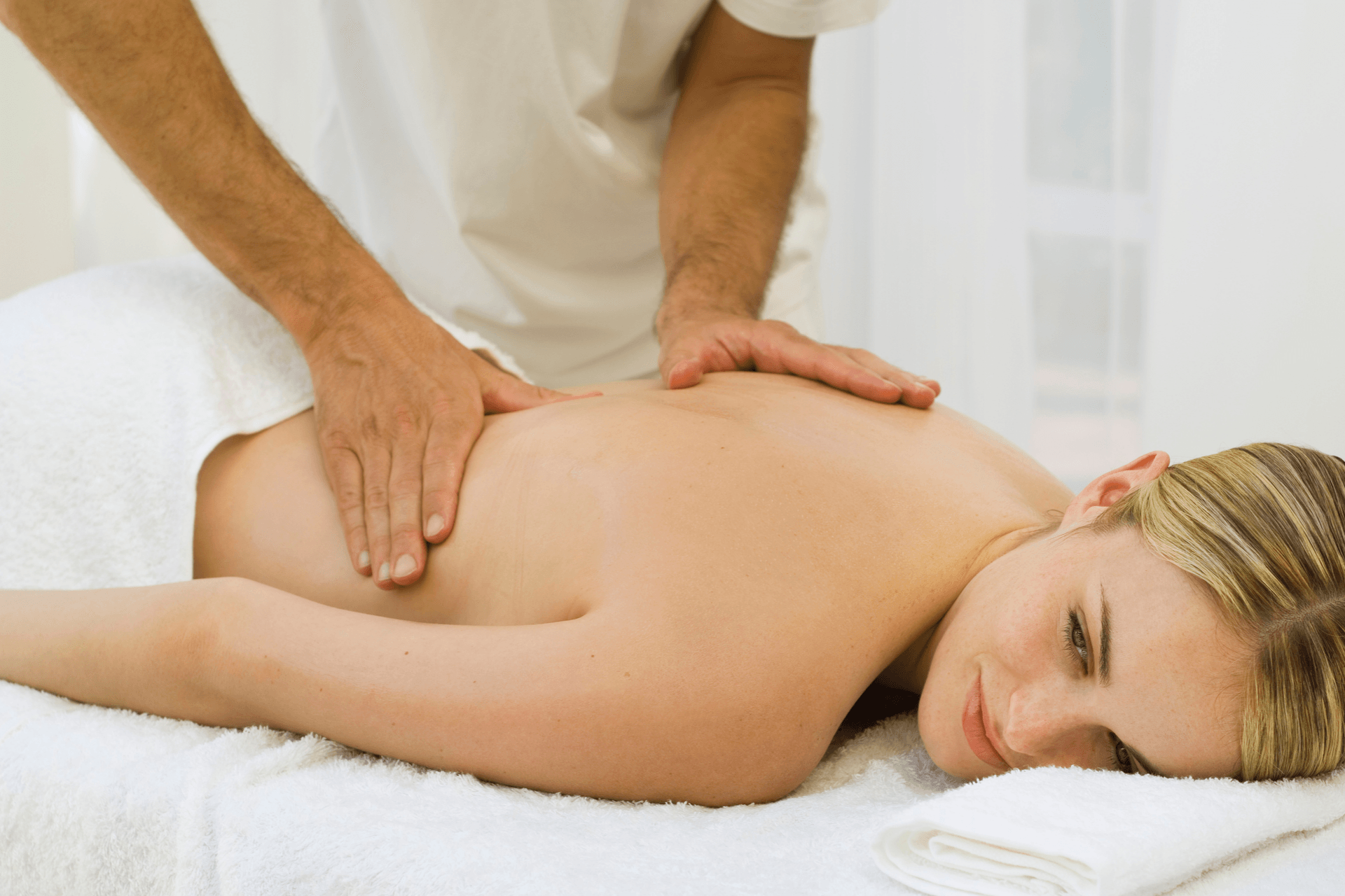 Woman receiving a sports massage Woman receiving a sports massage