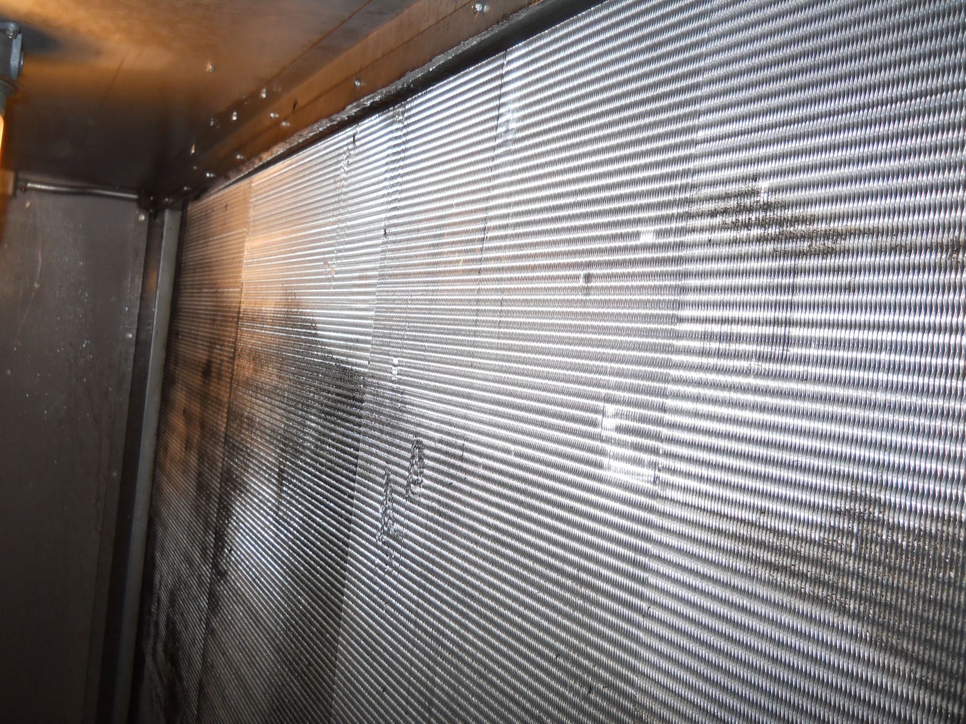a close up of an aircon unit's condenser