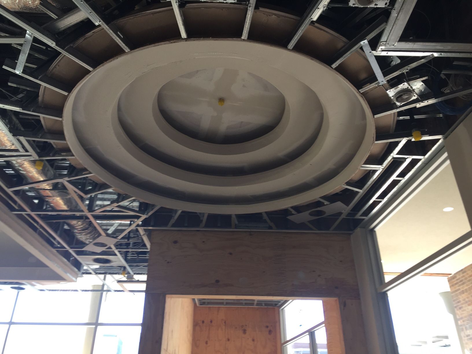 A building under construction with a circular ceiling
