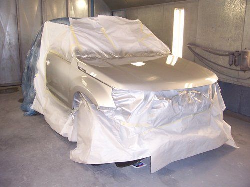 A Mechanic Doing Car Body Paint — DeSoto, TX — Escobar & Son Paint & Body Shop