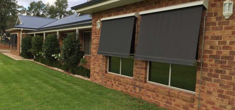 automatic lock arm fabric rollup awning