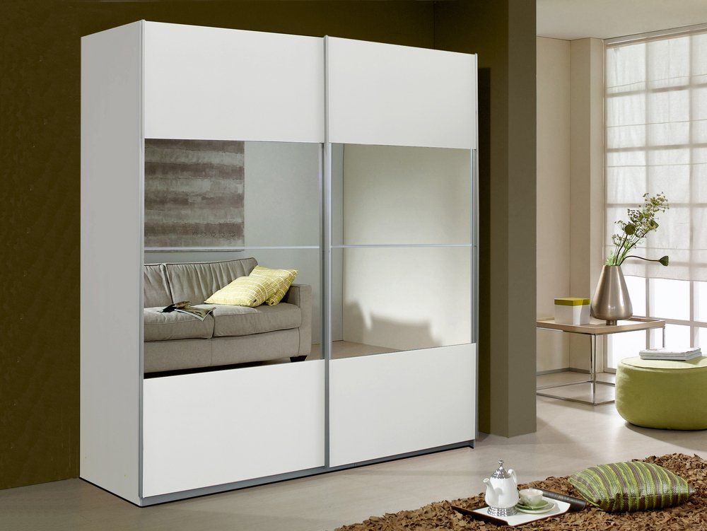 closet with mirror on door