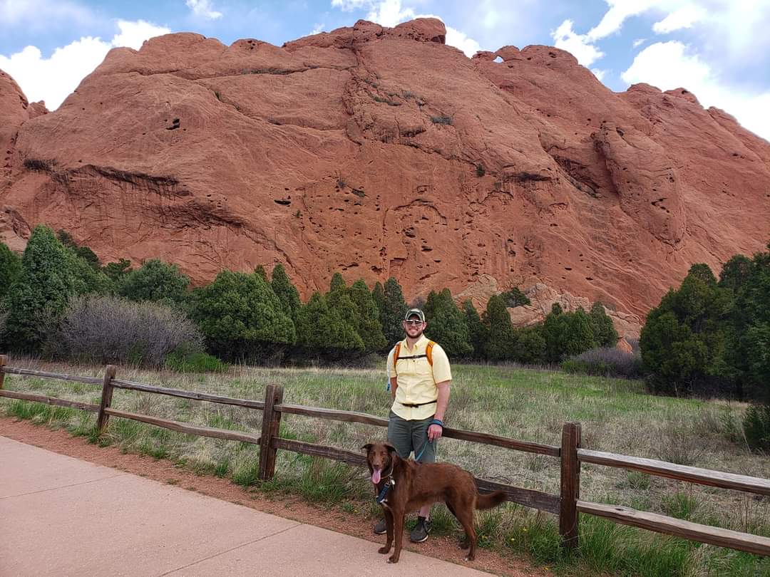 Owner with dog in red rocks area